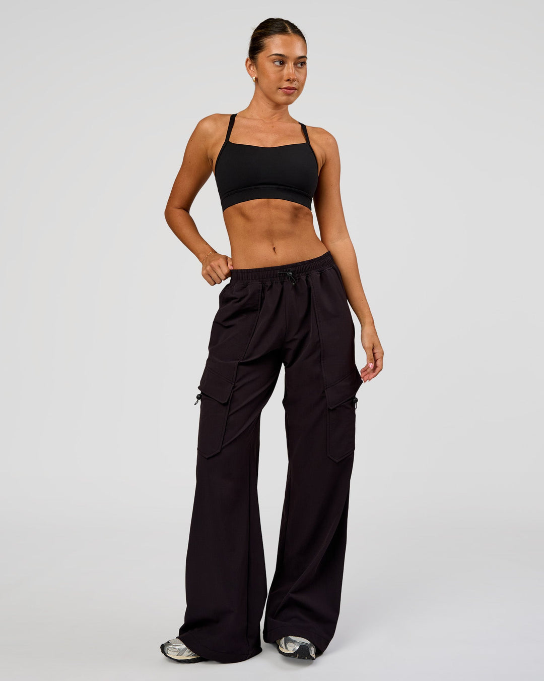 Woman wearing Endeavour Cargo Pant - Black | Model:Charli | Size:XS - view 9