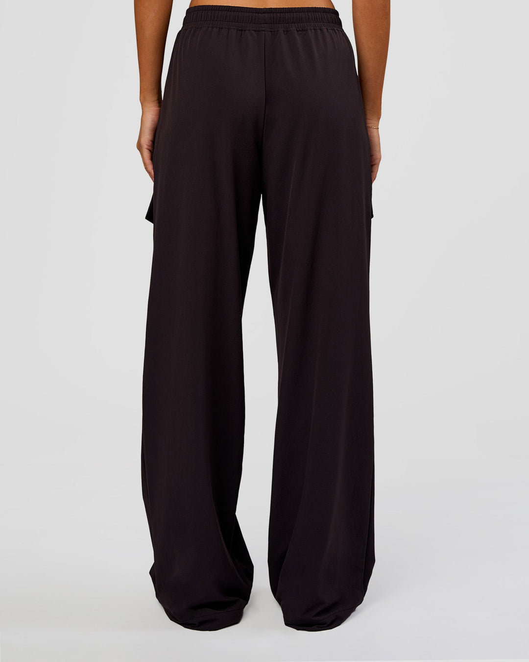 Woman wearing Endeavour Cargo Pant - Black | Model:Charli | Size:XS - view 7