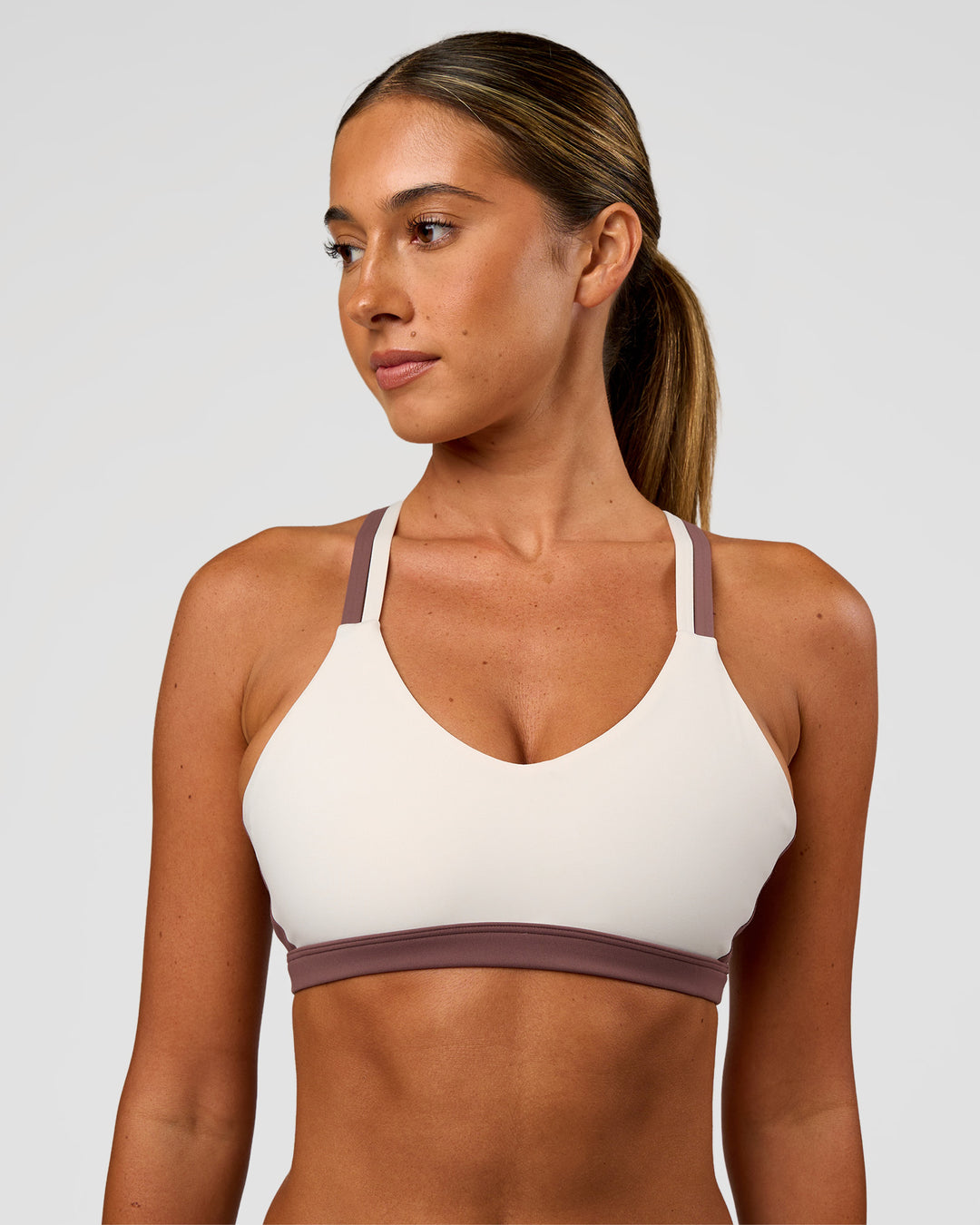 Woman wearing Force Sports Bra - Cocoa Powder-Off White | Model:Charli | Size:XS - view 1