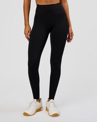 Woman wearing Fusion Bonded High-Rise Full Length Legging Pockets - Black | Model:Charli | Size:XS | Thumbnail Index: 0