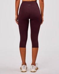 Woman wearing Fusion V Contour Ultra High-Rise 3/4 Legging Pockets - Cherry Lacquer | Model:Charli | Size:XS | Thumbnail Index: 7