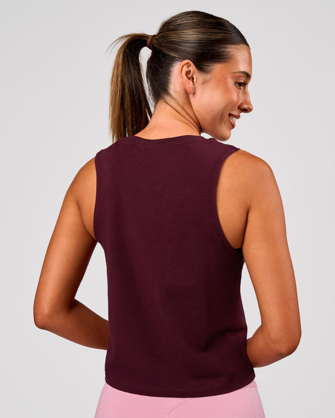 Woman wearing Go-To FLXCotton Midline Tank - Cherry Lacquer-White | Model:Charli | Size:XS - view 2