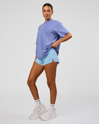 Woman wearing Go-To FLXCotton Oversized Tee - Bluebell Washed-White | Model:Charli | Size:XS | Thumbnail Index: 2