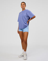Woman wearing Go-To FLXCotton Oversized Tee - Bluebell Washed-White | Model:Charli | Size:XS | Thumbnail Index: 4