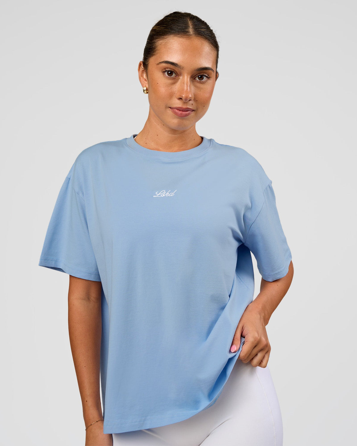 Woman wearing Go-To Script FLXCotton Oversized Tee - Open Air | Model:Charli | Size:XS