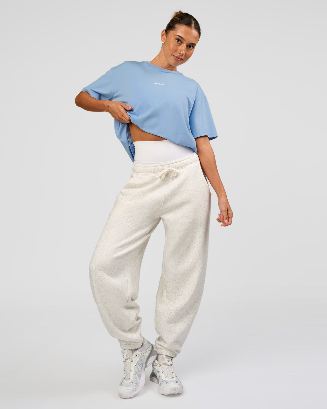 Woman wearing Go-To Script FLXCotton Oversized Tee - Open Air | Model:Charli | Size:XS