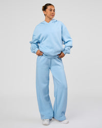 Woman wearing Go-To Script Oversized Hoodie - Open Air | Model:Charli | Size:XS | Thumbnail Index: 4