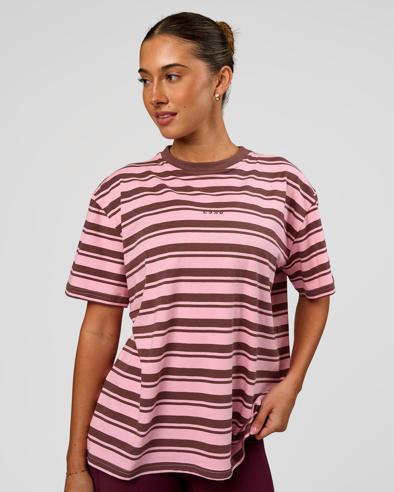 Woman wearing Go-To Shadow Stripe FLXCotton Oversized Tee - Pink Rose-Cocoa Powder | Model:Charli | Size:XS