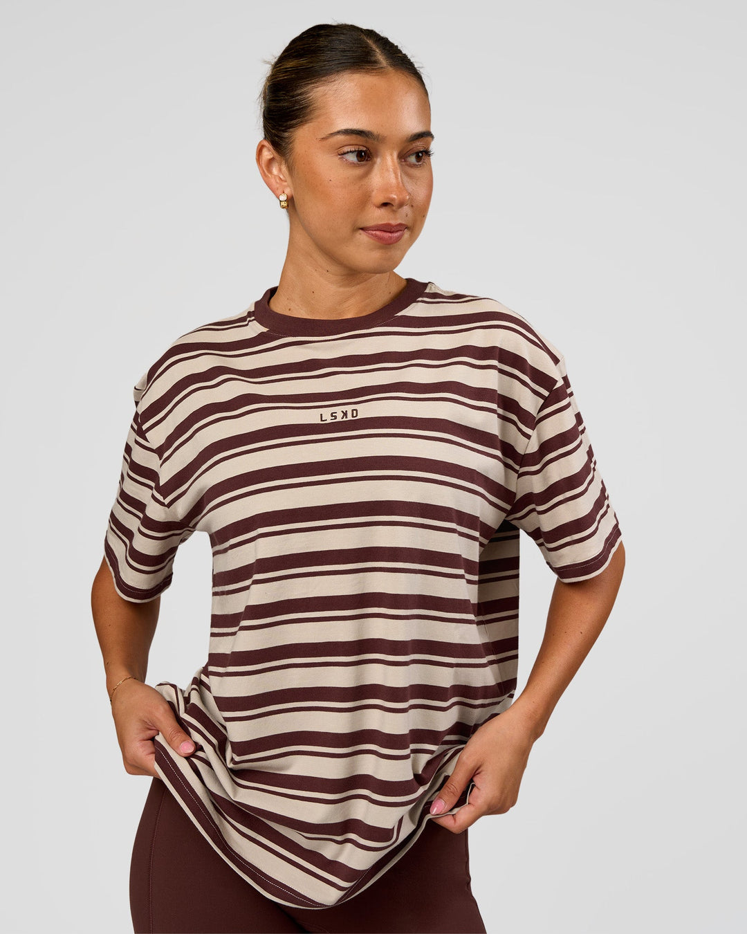 Woman wearing Go-To Shadow Stripe FLXCotton Oversized Tee - Shale Beige-Hot Chocolate | Model:Charli | Size:XS - view 1
