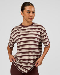 Woman wearing Go-To Shadow Stripe FLXCotton Oversized Tee - Shale Beige-Hot Chocolate | Model:Charli | Size:XS | Thumbnail Index: 0