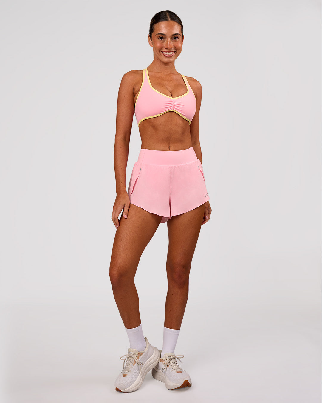 Woman wearing Luminous Sports Bra - Pink Rose-Lemon | Model:Charli | Size:XS - view 5
