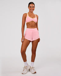 Woman wearing Luminous Sports Bra - Pink Rose-Lemon | Model:Charli | Size:XS | Thumbnail Index: 4