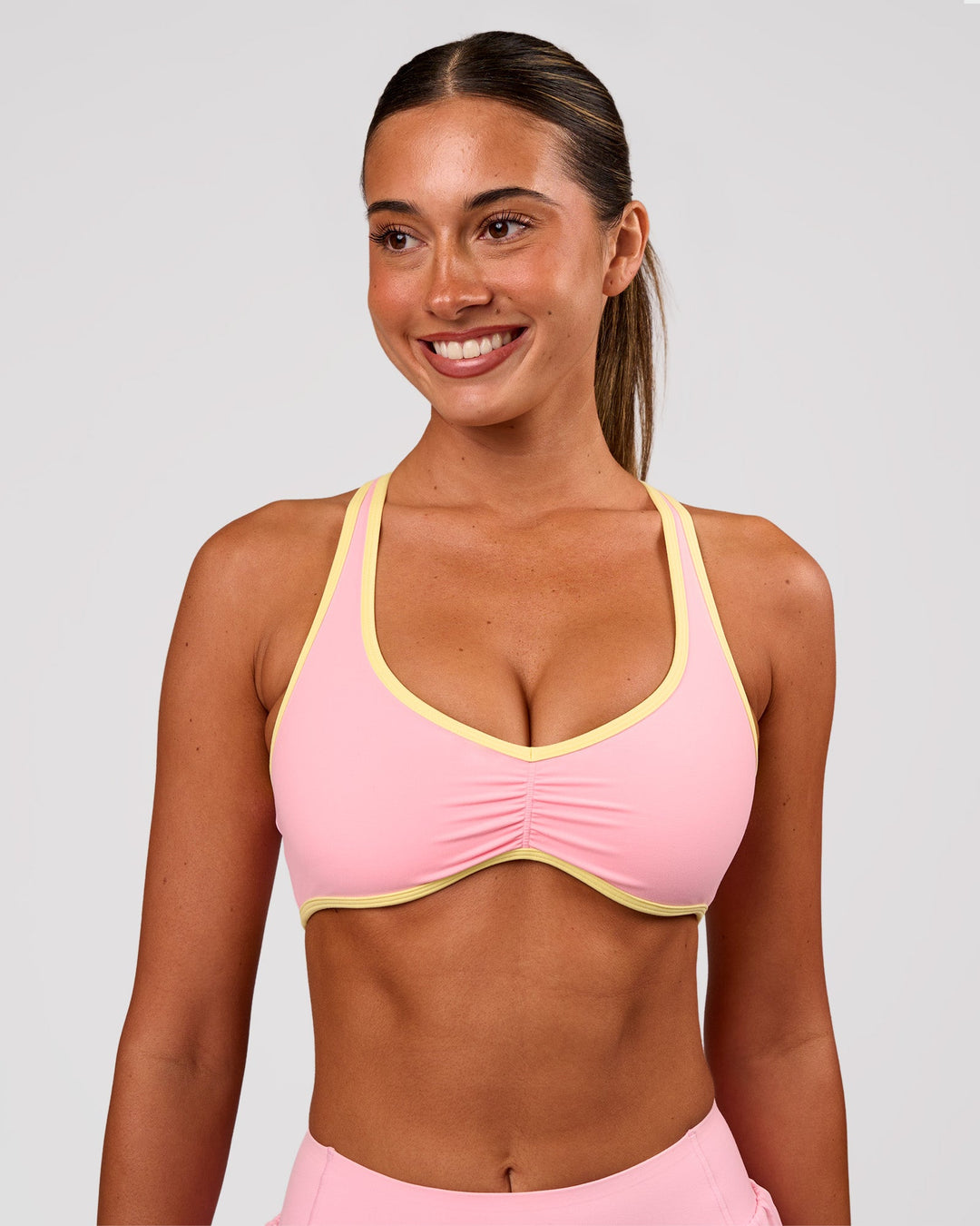 Woman wearing Luminous Sports Bra - Pink Rose-Lemon | Model:Charli | Size:XS - view 6