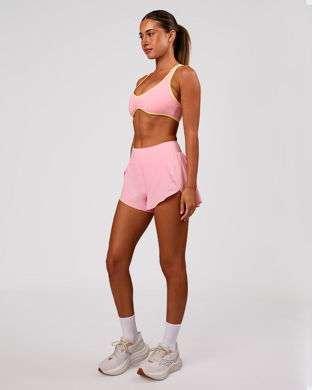 Woman wearing Luminous Sports Bra - Pink Rose-Lemon | Model:Charli | Size:XS - view 10