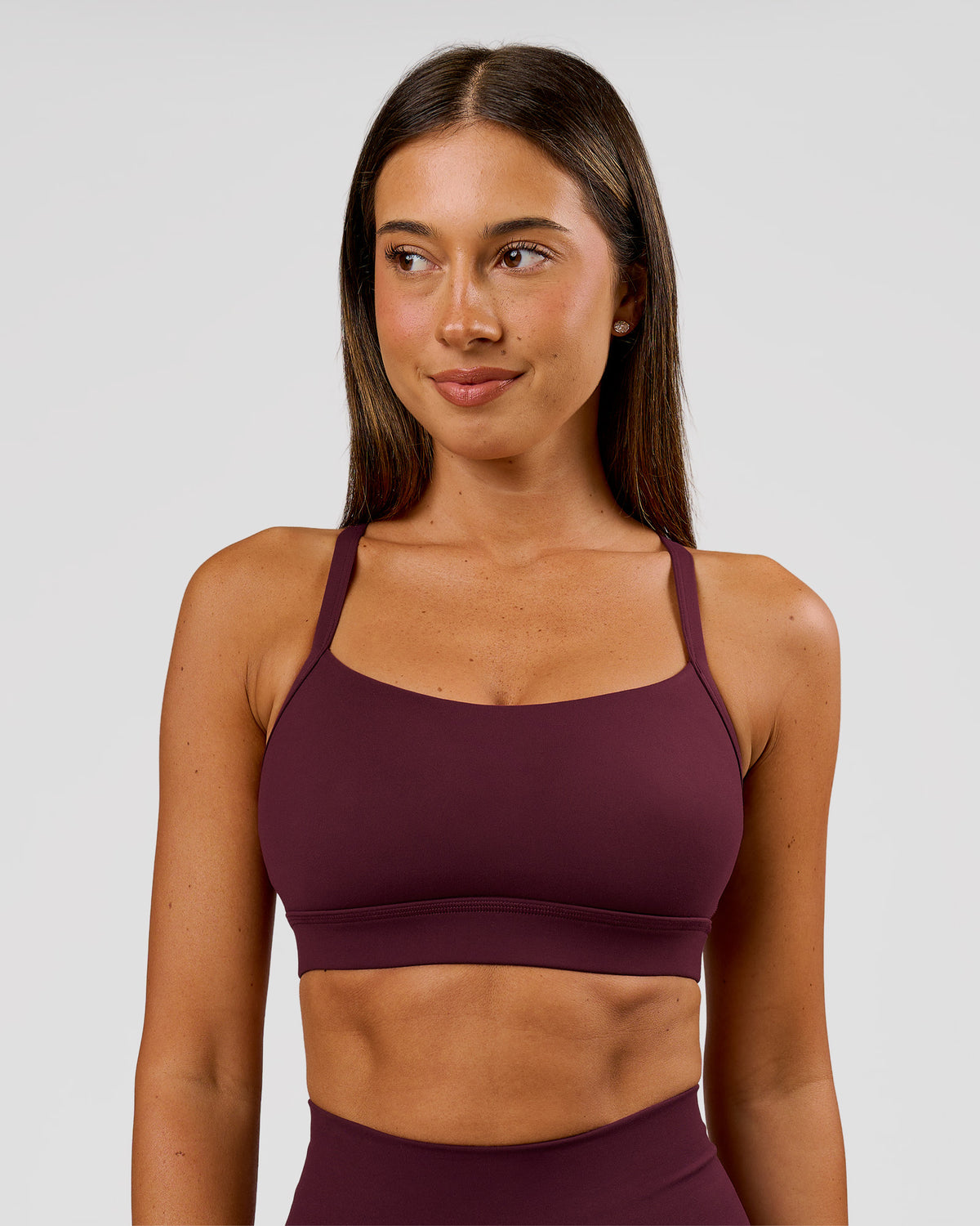 Woman wearing Momentum Sports Bra D/DD/E - Cherry Lacquer | Model:Charli | Size:XS - view 1