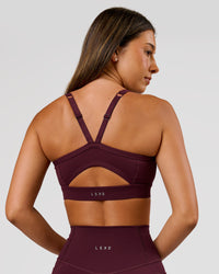 Woman wearing Momentum Sports Bra D/DD/E - Cherry Lacquer | Model:Charli | Size:XS | Thumbnail Index: 1