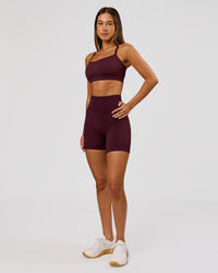Woman wearing Momentum Sports Bra D/DD/E - Cherry Lacquer | Model:Charli | Size:XS | Thumbnail Index: 4