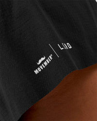 Woman wearing Movember x LSKD Accelerate 3" High-Rise Running Short - Black | Model:Charli | Size:XS | Thumbnail Index: 5