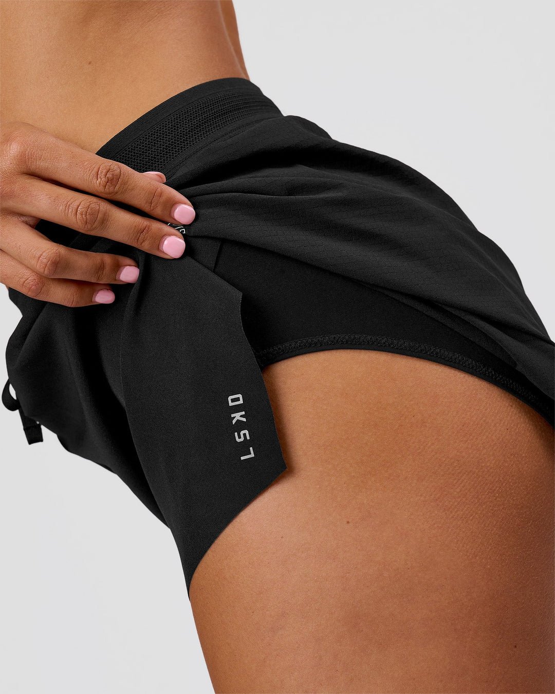 Woman wearing Movember x LSKD Accelerate 3" High-Rise Running Short - Black | Model:Charli | Size:XS - view 15