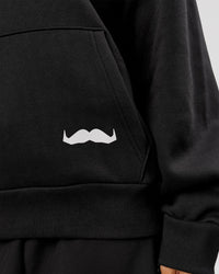 Woman wearing Movember x LSKD Oversized Hoodie - Black | Model:Charli | Size:XS | Thumbnail Index: 9