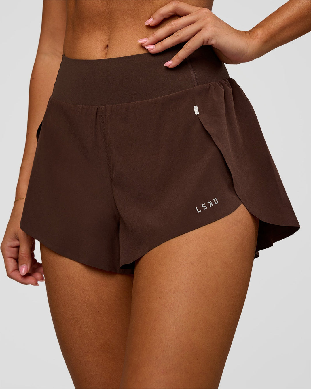 Woman wearing Pacer 3" Run Short - Hot Chocolate | Model:Charli | Size:XS - view 1