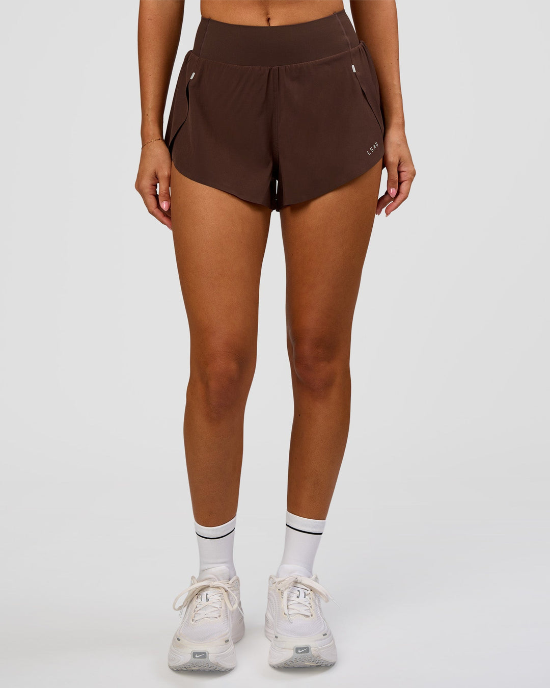 Woman wearing Pacer 3" Run Short - Hot Chocolate | Model:Charli | Size:XS - view 3