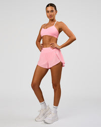 Woman wearing Pacer 3" Run Short - Pink Rose | Model:Charli | Size:XS | Thumbnail Index: 2