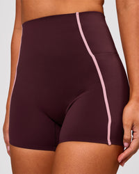 Woman wearing Power Ultra High-Rise 4" Short Pockets - Cherry Lacquer-Pink Rose | Model:Charli | Size:XS | Thumbnail Index: 0