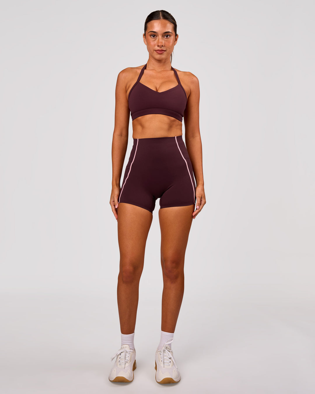Woman wearing Power Ultra High-Rise 4" Short Pockets - Cherry Lacquer-Pink Rose | Model:Charli | Size:XS - view 3