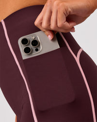 Woman wearing Power Ultra High-Rise 4" Short Pockets - Cherry Lacquer-Pink Rose | Model:Charli | Size:XS | Thumbnail Index: 3