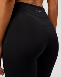 Woman wearing Solstice High-Rise Full Length Legging - Black | Model:Charli | Size:XS | Thumbnail Index: 3