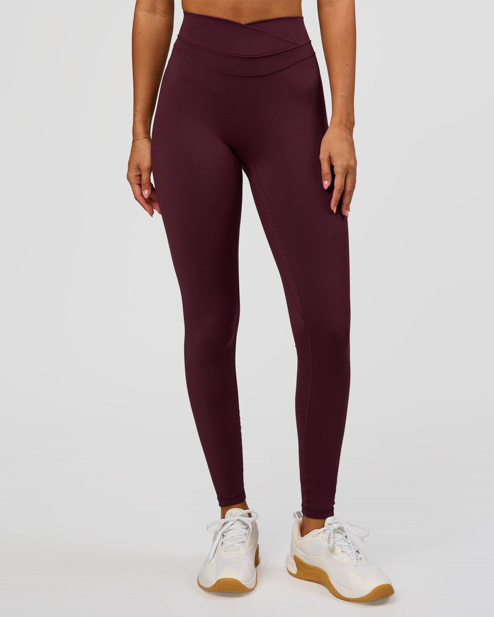 Woman wearing Solstice High-Rise Full Length Legging - Cherry Lacquer | Model:Charli | Size:XS