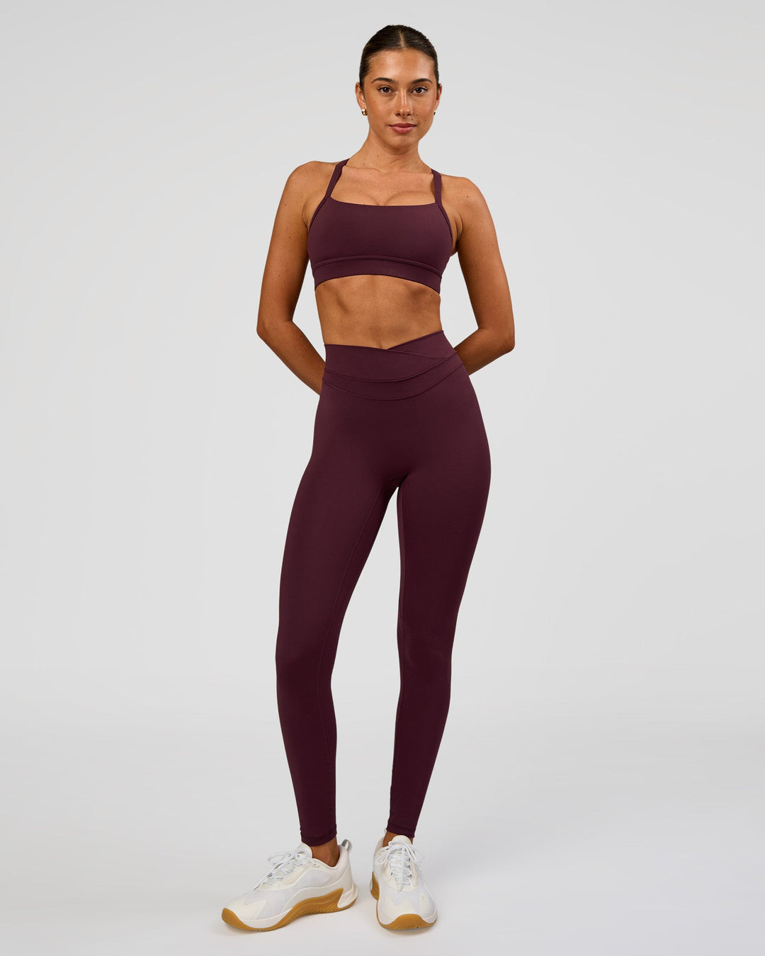Woman wearing Solstice High-Rise Full Length Legging - Cherry Lacquer | Model:Charli | Size:XS - view 4