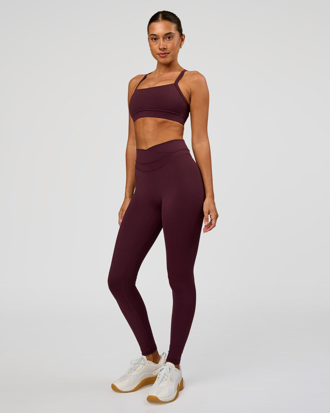 Woman wearing Solstice High-Rise Full Length Legging - Cherry Lacquer | Model:Charli | Size:XS - view 5