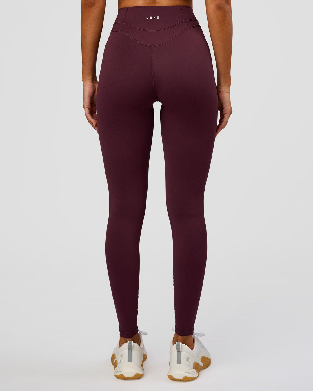 Woman wearing Solstice High-Rise Full Length Legging - Cherry Lacquer | Model:Charli | Size:XS - view 7