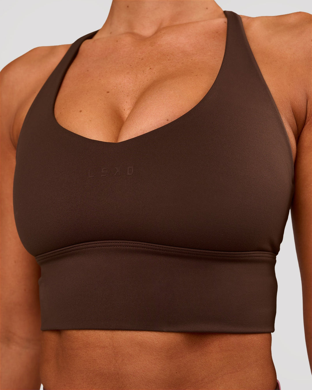 Woman wearing Stellar Long Line Sports Bra - Hot Chocolate | Model:Charli | Size:XS - view 3
