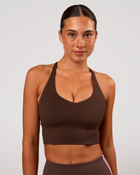 Woman wearing Stellar Long Line Sports Bra - Hot Chocolate | Model:Charli | Size:XS | Thumbnail Index: 3
