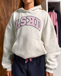 Woman wearing Varsity Boxy Hoodie - Off White-Pink Rose | Model:Charli | Size:XS | Thumbnail Index: 13