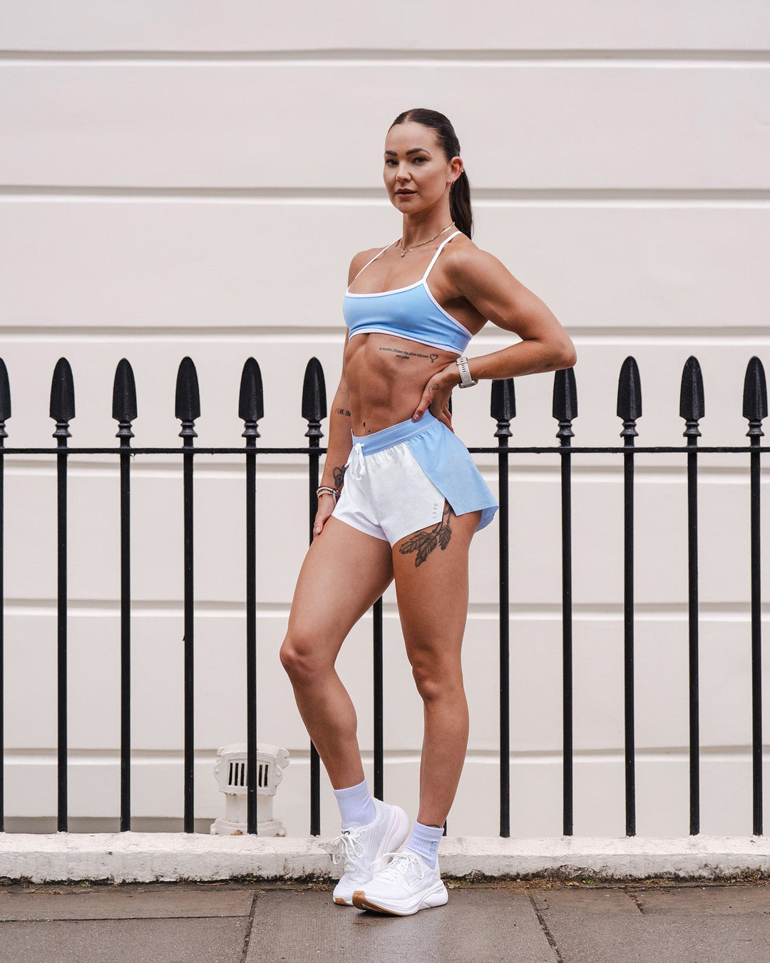Woman wearing Accelerate 3" Mid-Rise Running Short - Open Air-White | Model:Charlotte | Size:XS - view 8