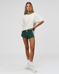 Woman wearing Be Here Now Heavyweight FLXCotton Tee Oversize - Silver Marl-Midnight Green | Model:Georgia | Size:XS | Thumbnail Index: 10