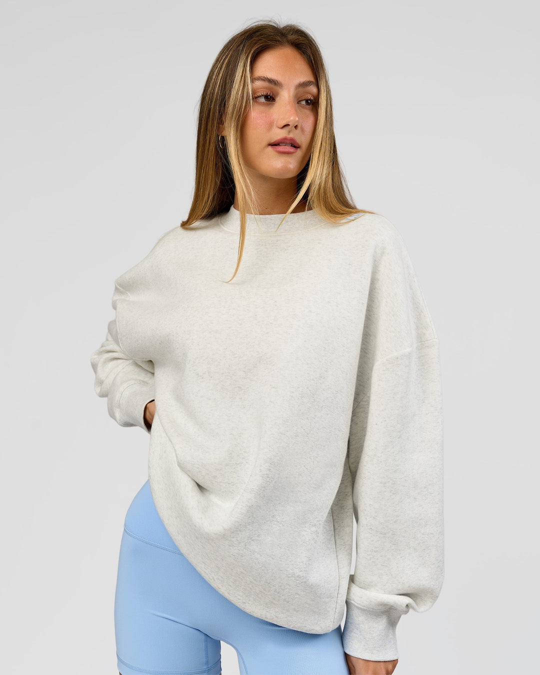 Woman wearing Strong is Beautiful Oversized Sweater - Silver Marl | Model:Georgia | Size:XS - view 11