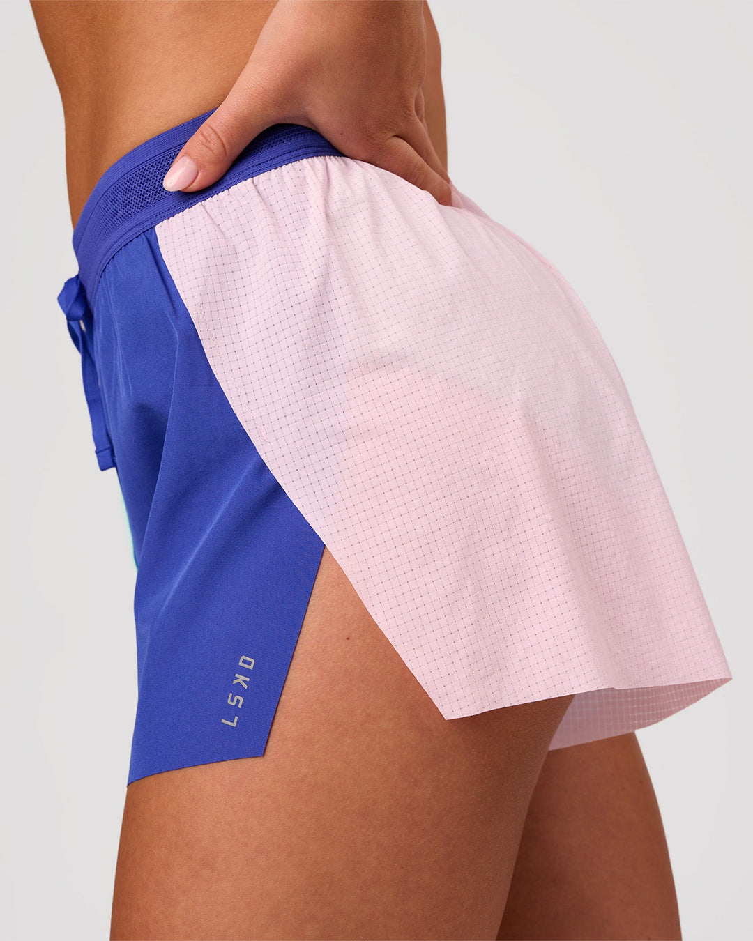 Woman wearing Accelerate 3" High-Rise Running Short - Power Cobalt-Prism | Model:Issy | Size:XS - view 9