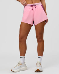 Woman wearing Accelerate 3" High-Rise Running Short - Boysenberry-Pink Rose | Model:Issy | Size:XS | Thumbnail Index: 3