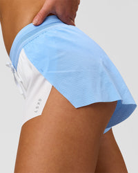 Woman wearing Accelerate 3" Mid-Rise Running Short - Open Air-White | Model:Issy | Size:XS | Thumbnail Index: 8
