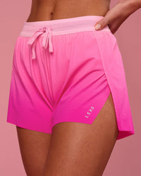 Woman wearing Accelerate Gradient 3" High-Rise Running Short - Pink Rose-Ultra Pink Gradient | Model:Issy | Size:XS | Thumbnail Index: 6