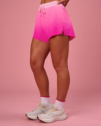 Woman wearing Accelerate Gradient 3" High-Rise Running Short - Pink Rose-Ultra Pink Gradient | Model:Issy | Size:XS | Thumbnail Index: 5