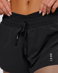 Woman wearing Accelerate Synergy 3" Running Short Short - Black-Black | Model:Issy | Size:XS | Thumbnail Index: 4