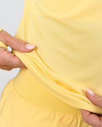 Woman wearing AeroFLX+ Long Sleeve Half Zip - Lemon/Lemon | Model:Issy | Size:XS | Thumbnail Index: 9