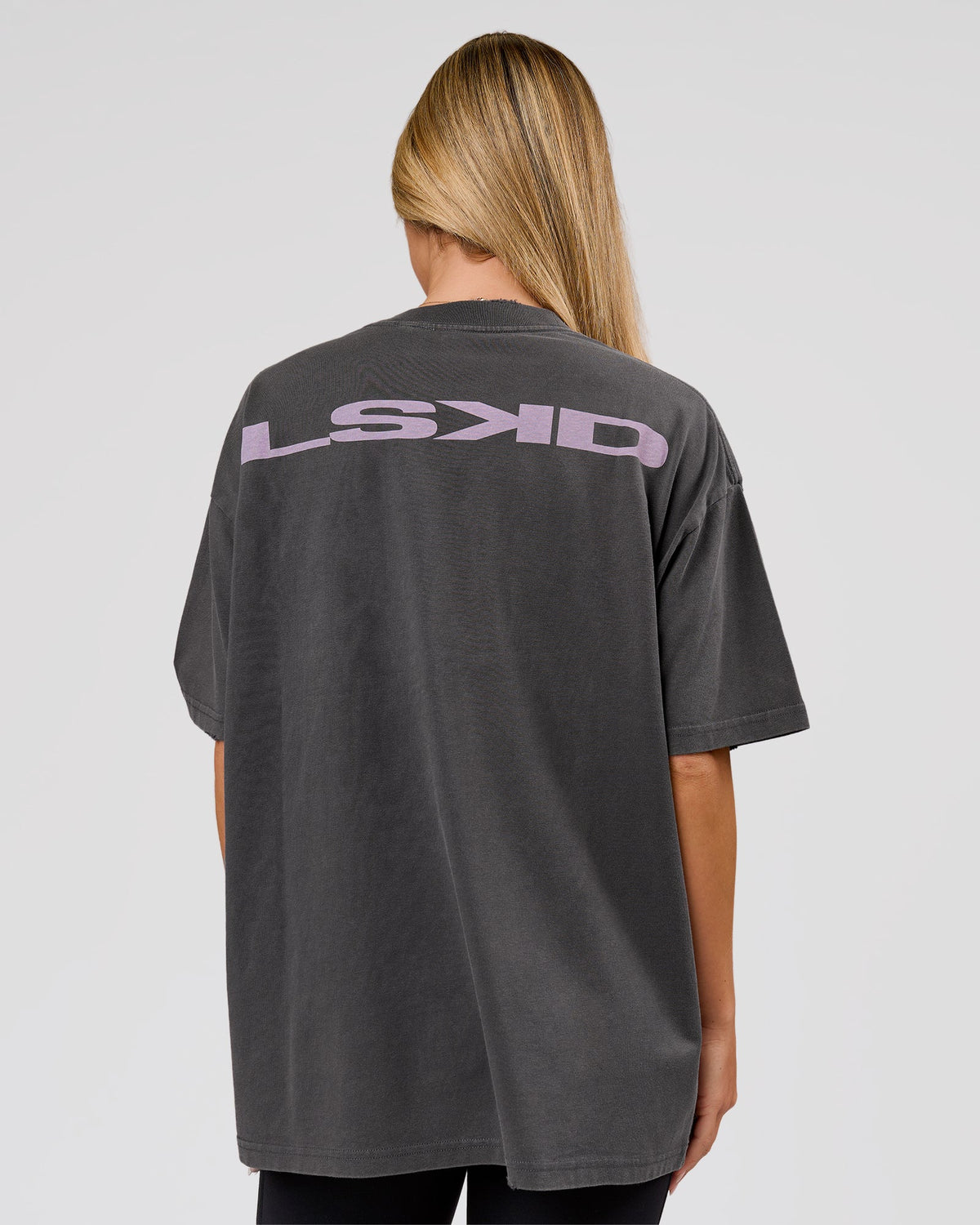 Woman wearing Backline Washed Heavyweight Oversized Tee - Asphalt Washed | Model:Issy | Size:XS - view 2