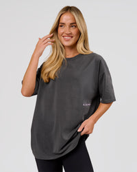 Woman wearing Backline Washed Heavyweight Oversized Tee - Asphalt Washed | Model:Issy | Size:XS | Thumbnail Index: 5